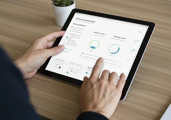 Person taking a self-assessment on a digital scale